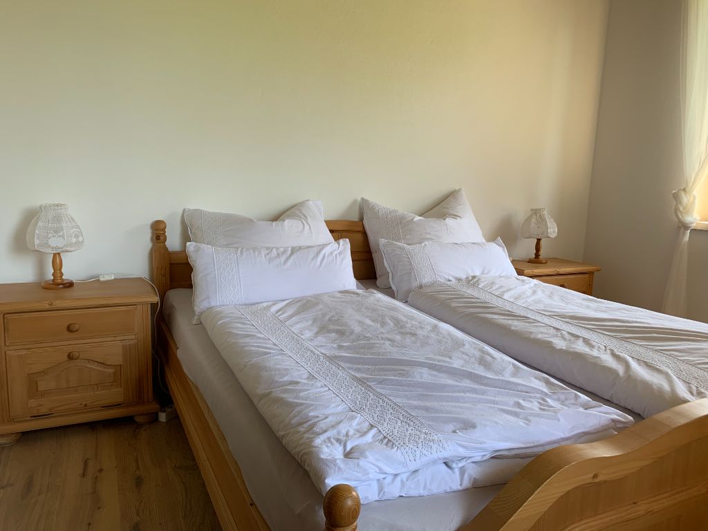 Apartment Uhudler Schlafbereich - Ruhige Schlafgelegenheiten für erholsame Nächte im Weingarten